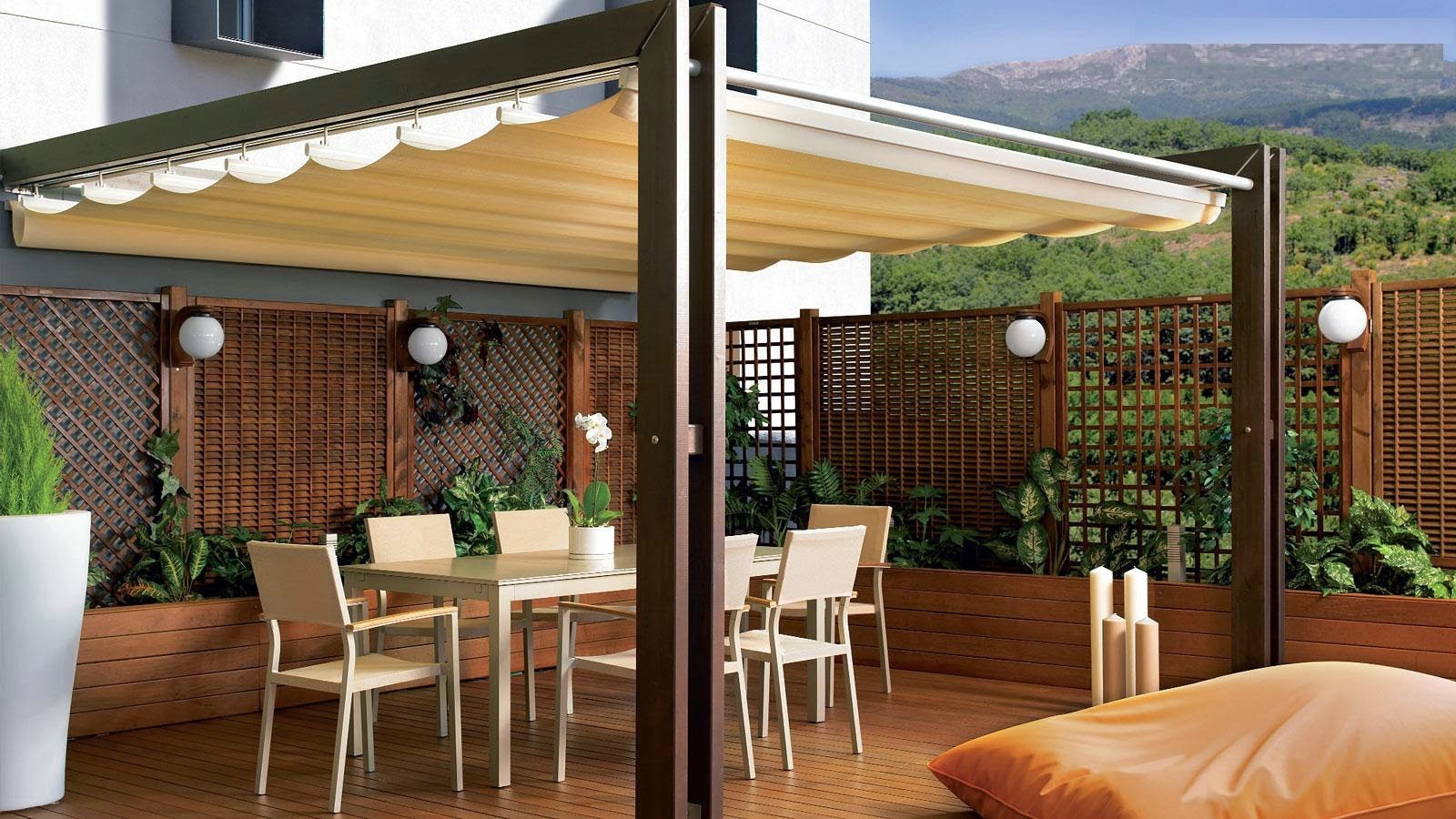 Terraza con pérgola y toldo de Toldos Las Mercedes